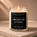 Candle labeled 'Scents of Reverie' with 'Frosted Oak & Vanilla' fragrance on a beige background