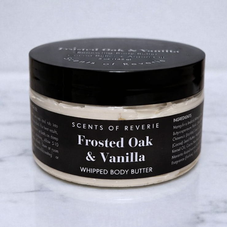 Jar of 'Frosted Oak & Vanilla' whipped body butter on a marble surface